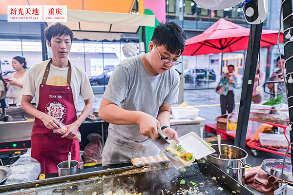 商家正在制作美食。主辦方供圖